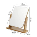 Vieux miroir de maquillage rotatif en bois