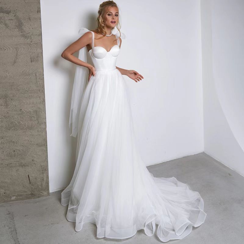 Robe de mariée sans pli de style français avec un arc avec un train Tulle